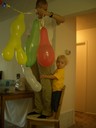 Aron helping dad put the ballons up for his party! 