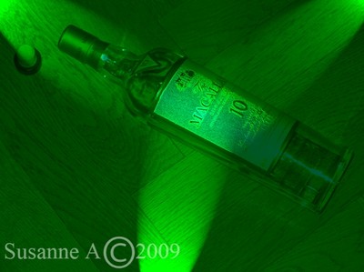 Grön flaska med strålkastare