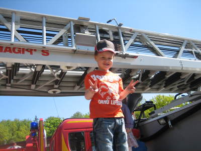 Daniel on top of a fire truck